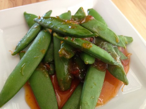 These sweet and spicy snap peas are ready in minutes and make a perfect side dish or healthy snack.