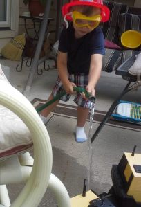 Jackson on Nonny's porch, puttin' out fires